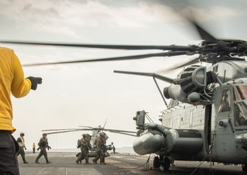 USS America (LHA 6) Sailors conduct flight operations