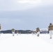 Arctic Angels Snowshoe Over Lake