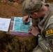 Soldiers conduct land navigation during the SETAF-AF Best Squad Competition