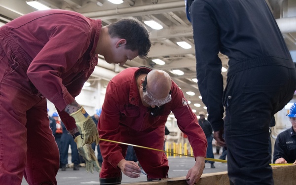 USS San Diego, Naval Beach Group 1 secure landing craft utility with wooden shoring