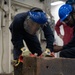 USS San Diego, Naval Beach Group 1 secure landing craft utility with wooden shoring