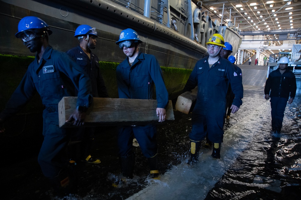 USS San Diego, Naval Beach Group 1 secure landing craft utility with wooden shoring