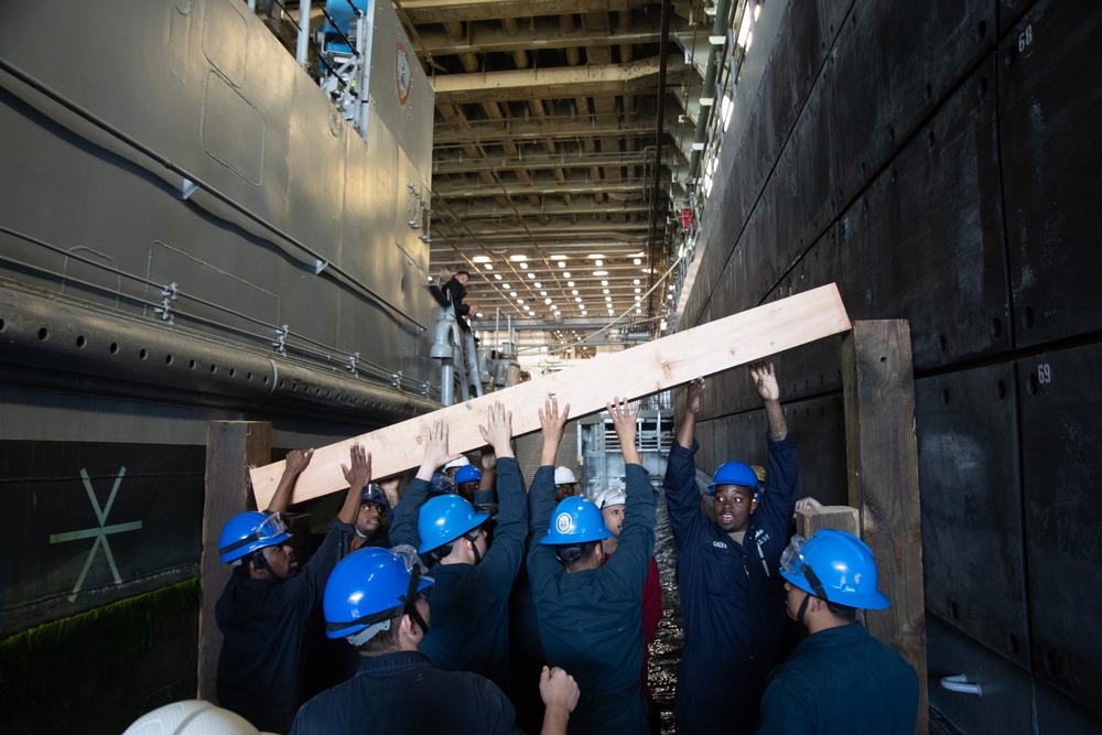 USS San Diego, Naval Beach Group 1 secure landing craft utility with wooden shoring