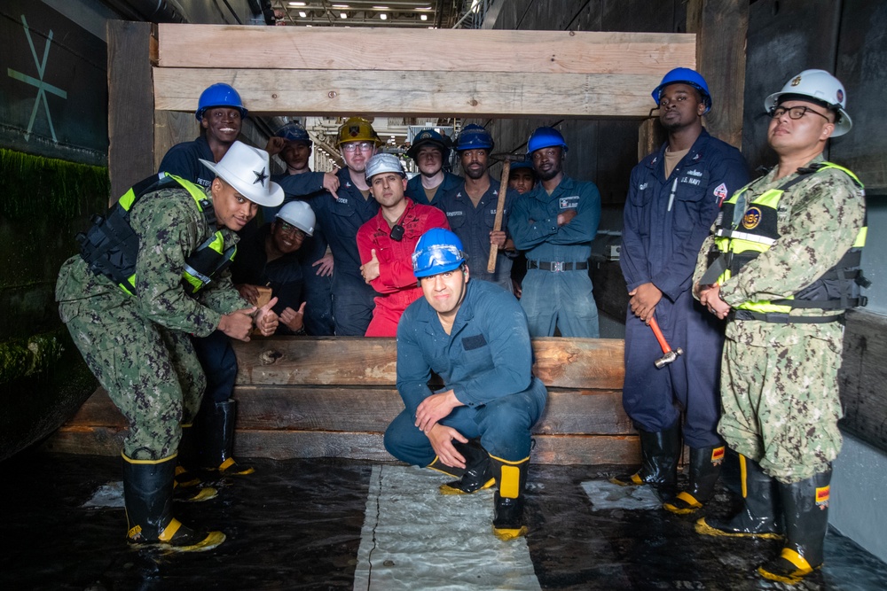 USS San Diego, Naval Beach Group 1 secure landing craft utility with wooden shoring