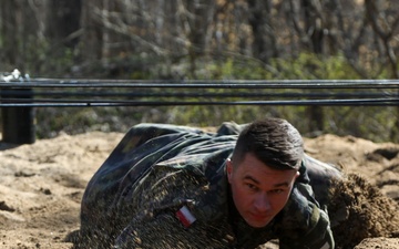 Polish Soldiers Navigate Obstacle Course
