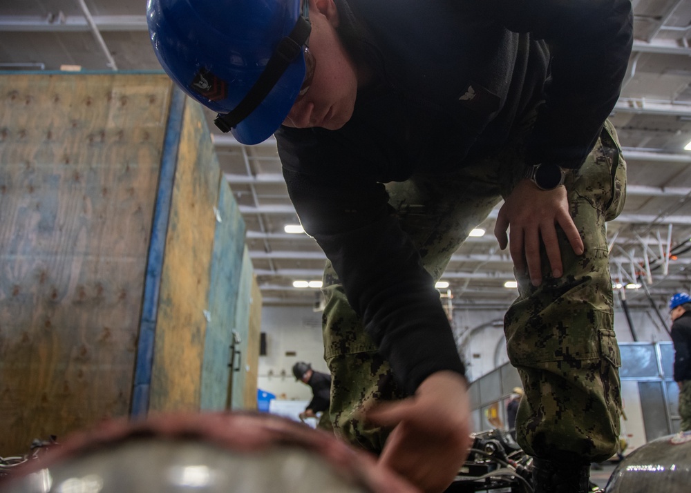 USS Ronald Reagan (CVN 76) Sailors perform SCBA maintenance