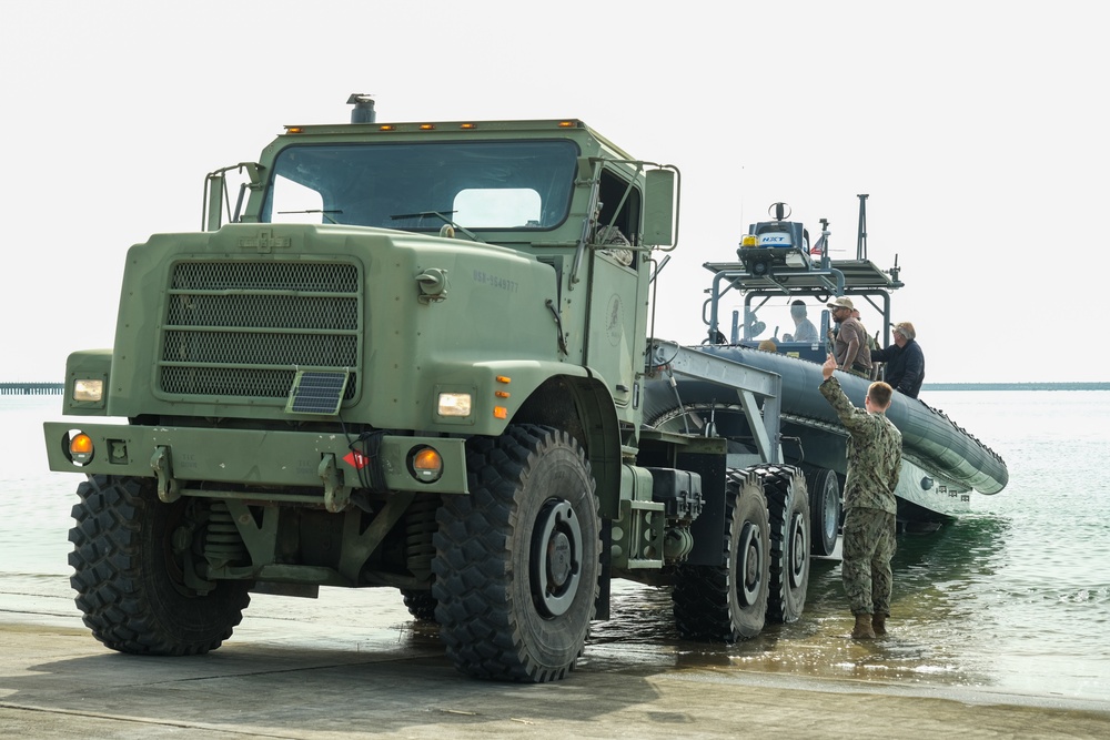 NMCB 11 Seabees transport MCM Det Rota Boat