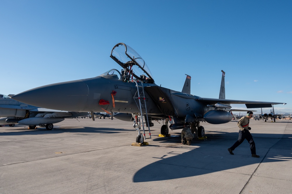 Airmen load GBU-38s on F-15E Strike Eagle during Red Flag-Nellis 24-2