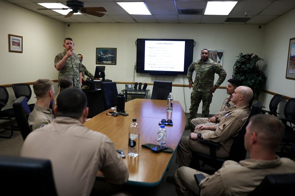 Marine Corps F-35B fixed-wing aircraft mechanics assigned to MAWTS-1 train with Air Force F-35A aircraft maintainers at Luke AFB during WTI 2-24