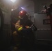 Sailors battle a simulated fire during a general quarters drill