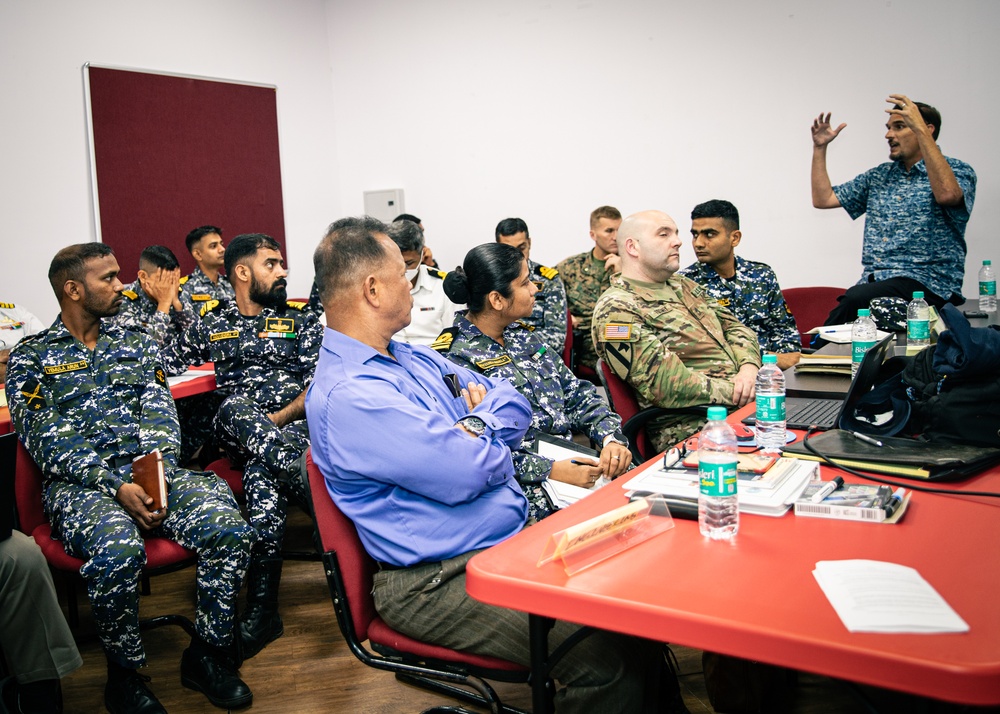 U.S. and Indian service members work together on a Human Assistance and Disaster Relief simulation during Exercise Tiger TRIUMPH 2024