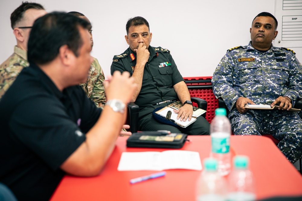 U.S. and Indian service members work together on a Human Assistance and Disaster Relief simulation during Exercise Tiger TRIUMPH 2024