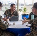 U.S. and Indian service members socialize at tea time during Exercise Tiger TRIUMPH 2024