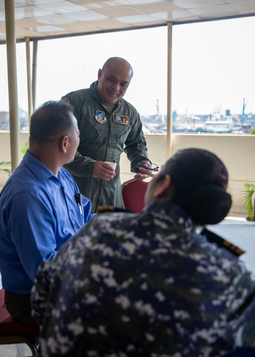 U.S. and Indian service members socialize at tea time during Exercise Tiger TRIUMPH 2024