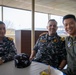 U.S. and Indian service members socialize at tea time during Exercise Tiger TRIUMPH 2024