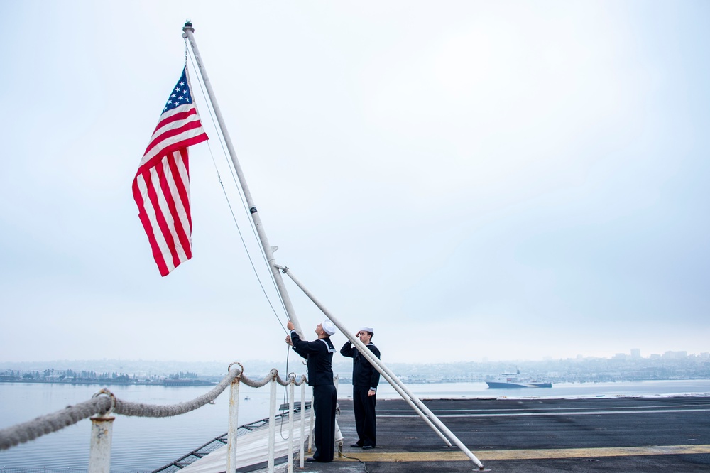USS Carl Vinson (CVN70) Sailors Conducts Colors