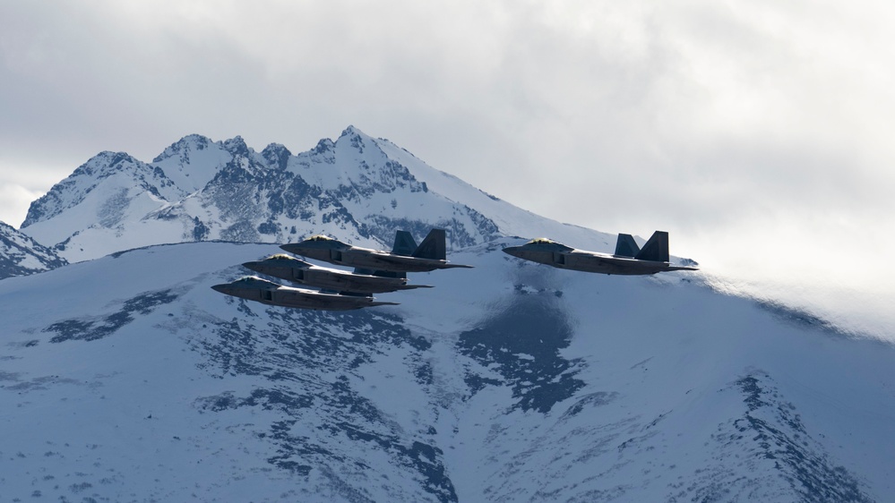 3rd Wing conducts a missing man formation flyover in remembrance of Staff Sgt. Charles A. Crumlett