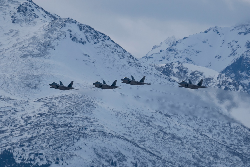 3rd Wing conducts a missing man formation flyover in remembrance of Staff Sgt. Charles A. Crumlett