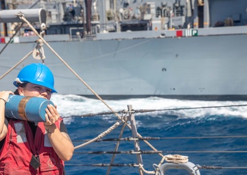 USS Gravely Conducts a Replenishment-at-Sea with USNS Supply