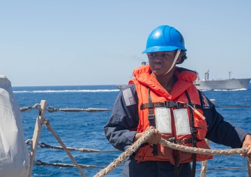 USS Gravely Conducts a Replenishment-at-Sea with USNS Supply