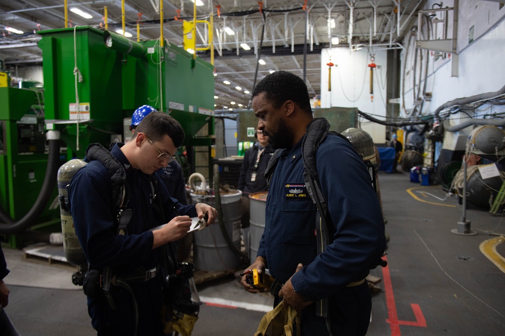 USS Ronald Reagan (CVN 76) Sailors conduct flying squad drill