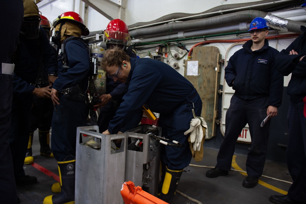USS Ronald Reagan (CVN 76) Sailors conduct flying squad drill