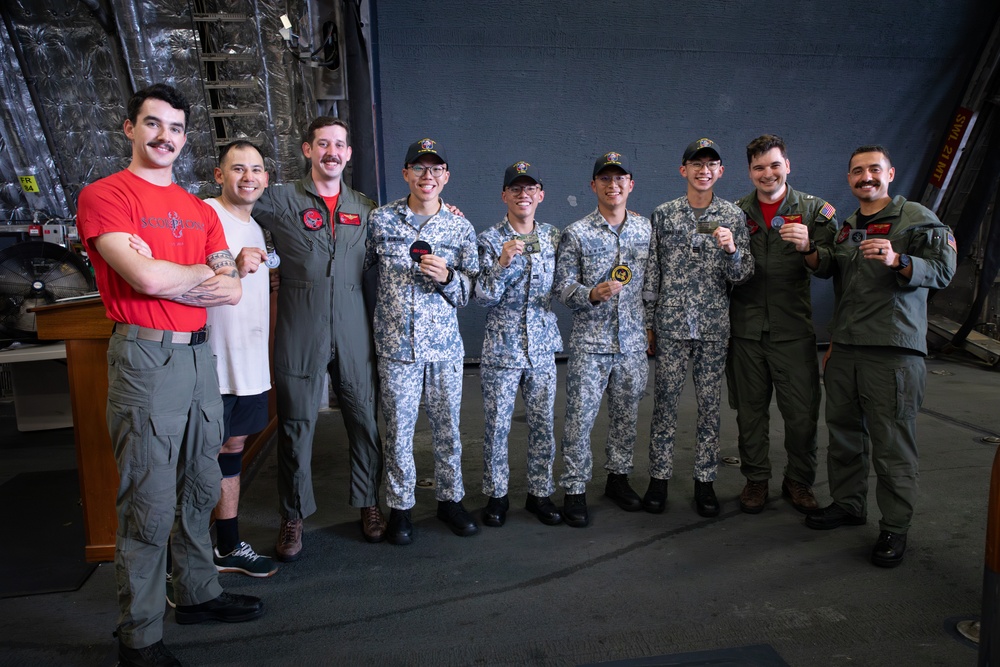 USS Mobile (LCS 26) Sailors Swap Patches with Singapore Navy