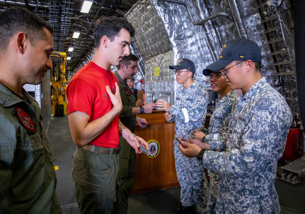 USS Mobile (LCS 26) Sailors Swap Patches with Singapore Navy