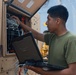 Marines Check Comms Aboard USS Somerset