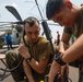 Marines Check Comms Aboard USS Somerset