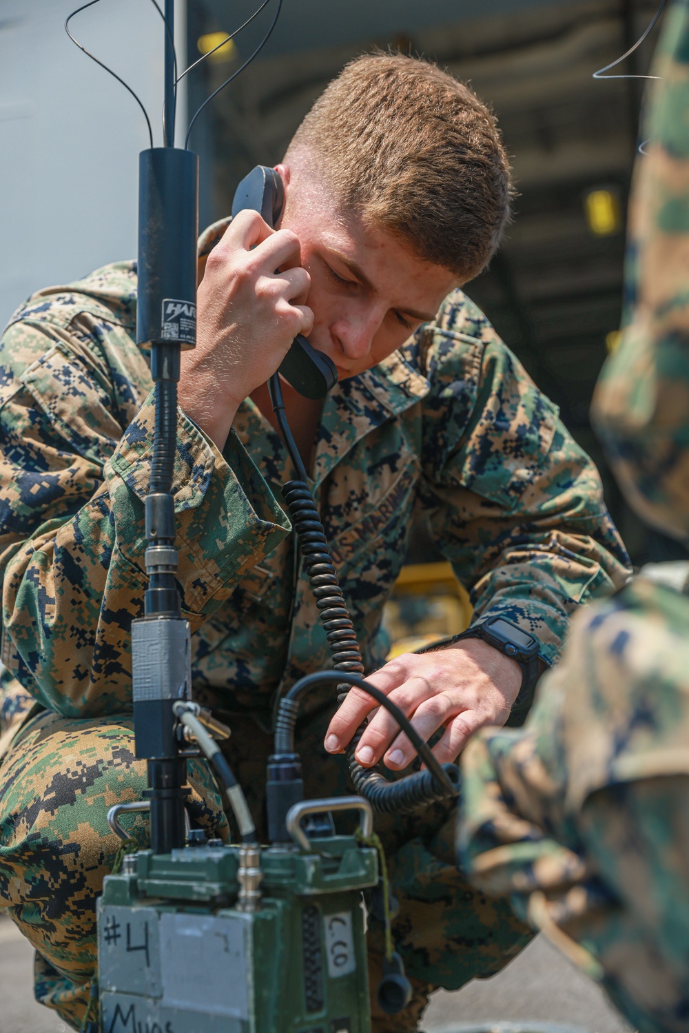 Marines Check Comms Aboard USS Somerset