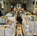 Airmen load Jordanian humanitarian aid onto AFCENT HC-130s for Gaza