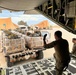 Airmen load Jordanian humanitarian aid onto AFCENT C-130s for Gaza