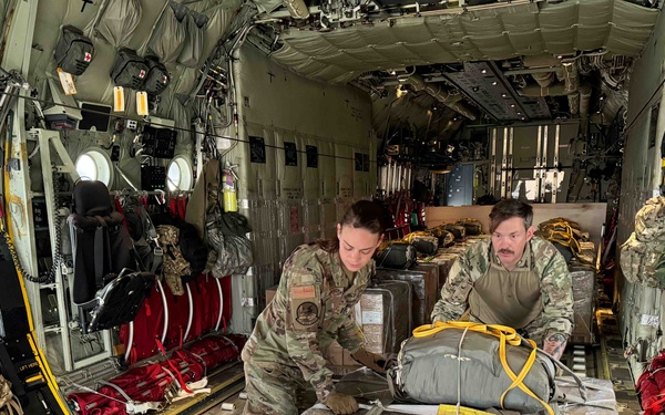 Airmen load Jordanian humanitarian aid onto AFCENT C-130s for Gaza