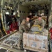 Airmen load Jordanian humanitarian aid onto AFCENT C-130s for Gaza