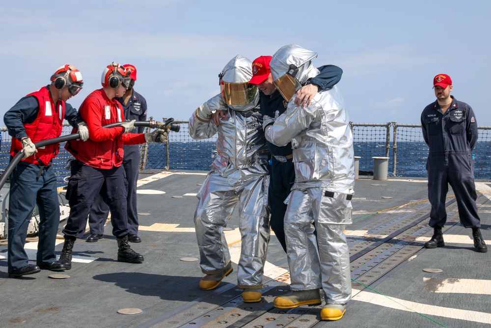 Sailors aboard the USS Howard (DDG 83) conduct a crash and salvage drill in the Sea of Japan
