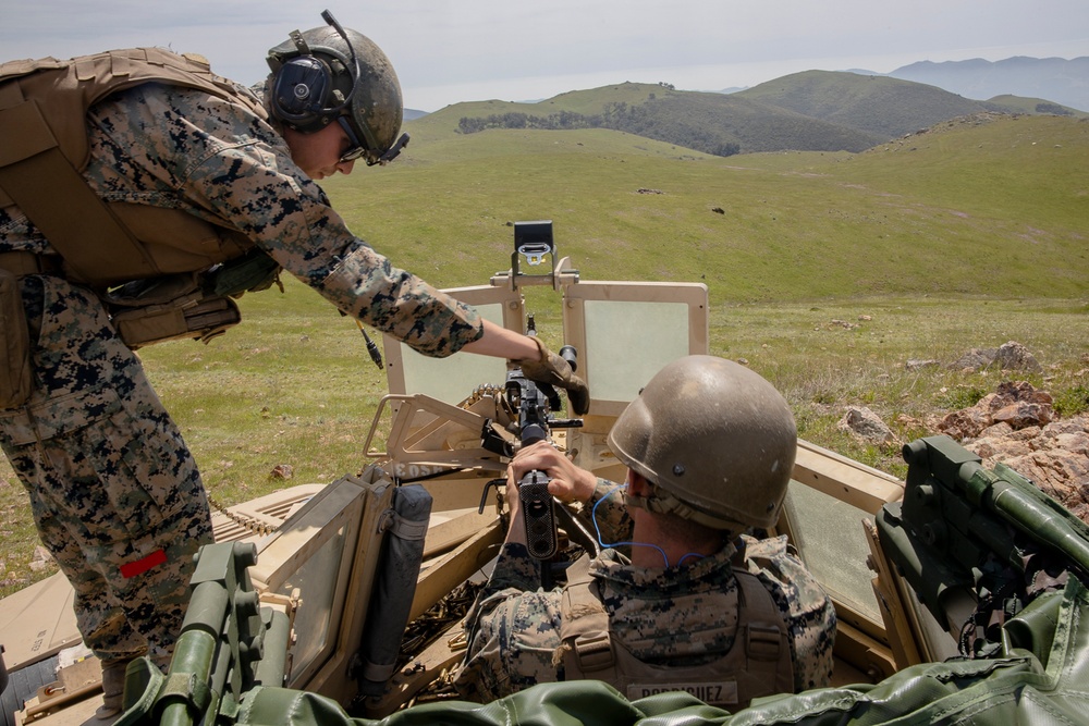 BELT-FED AND FIRING: Ground Distribution Company conducts a static mounted machine gun range