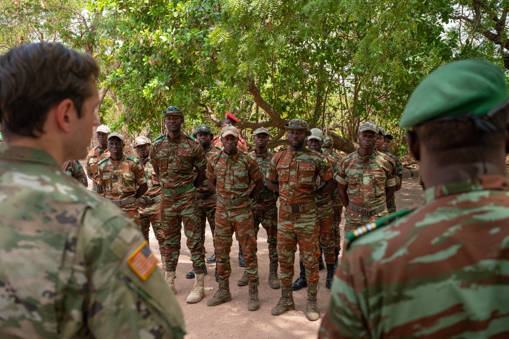 U.S. Army soldiers with the 91st Civil Affairs Battalion deployed with Special Operations Command Africa, conduct a knowledge exchange with Forces des Armées Beninoises members