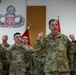 Lt. Gen. Christopher Donahue awards Soldiers with Challenge Coin
