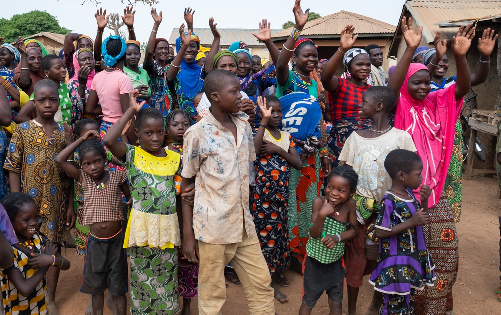 U.S. Army soldiers with the 91st Civil Affairs Battalion deployed with Special Operations Command Africa, conduct a civil engagement with Forces des Armées Beninoises members