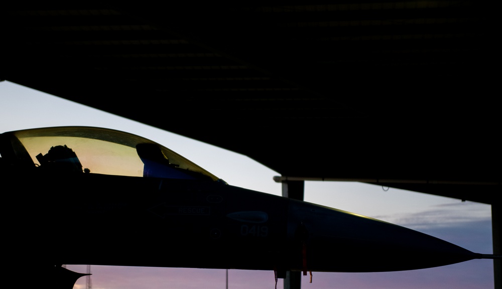 Sun Rises on F-16 at 122nd Fighter Wing