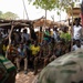 U.S. Army soldiers with the 91st Civil Affairs Battalion deployed with Special Operations Command Africa, conduct a civil engagement with Forces des Armées Beninoises members