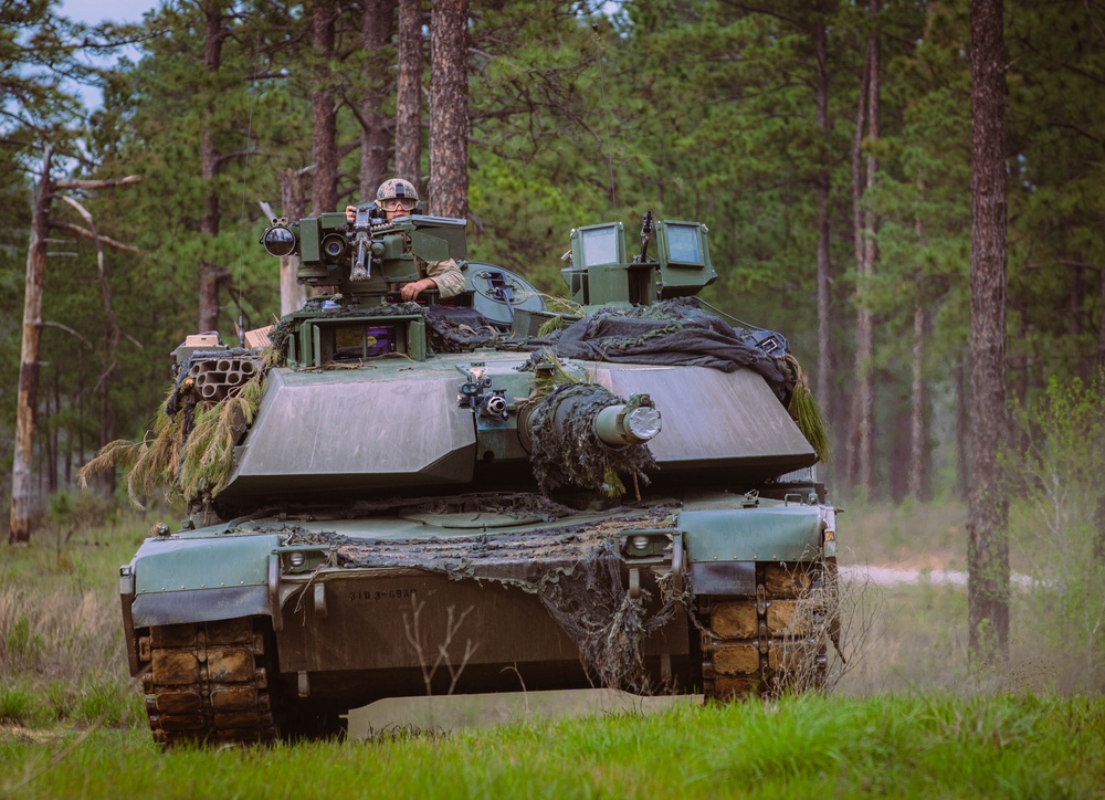 Armored units support infantry at the Joint Readiness Training Center