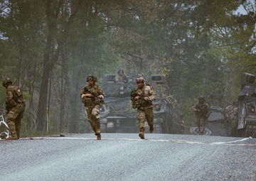 Armored units support infantry at the Joint Readiness Training Center