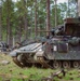 Armored units support infantry at the Joint Readiness Training Center