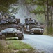 Armored units support infantry at the Joint Readiness Training Center