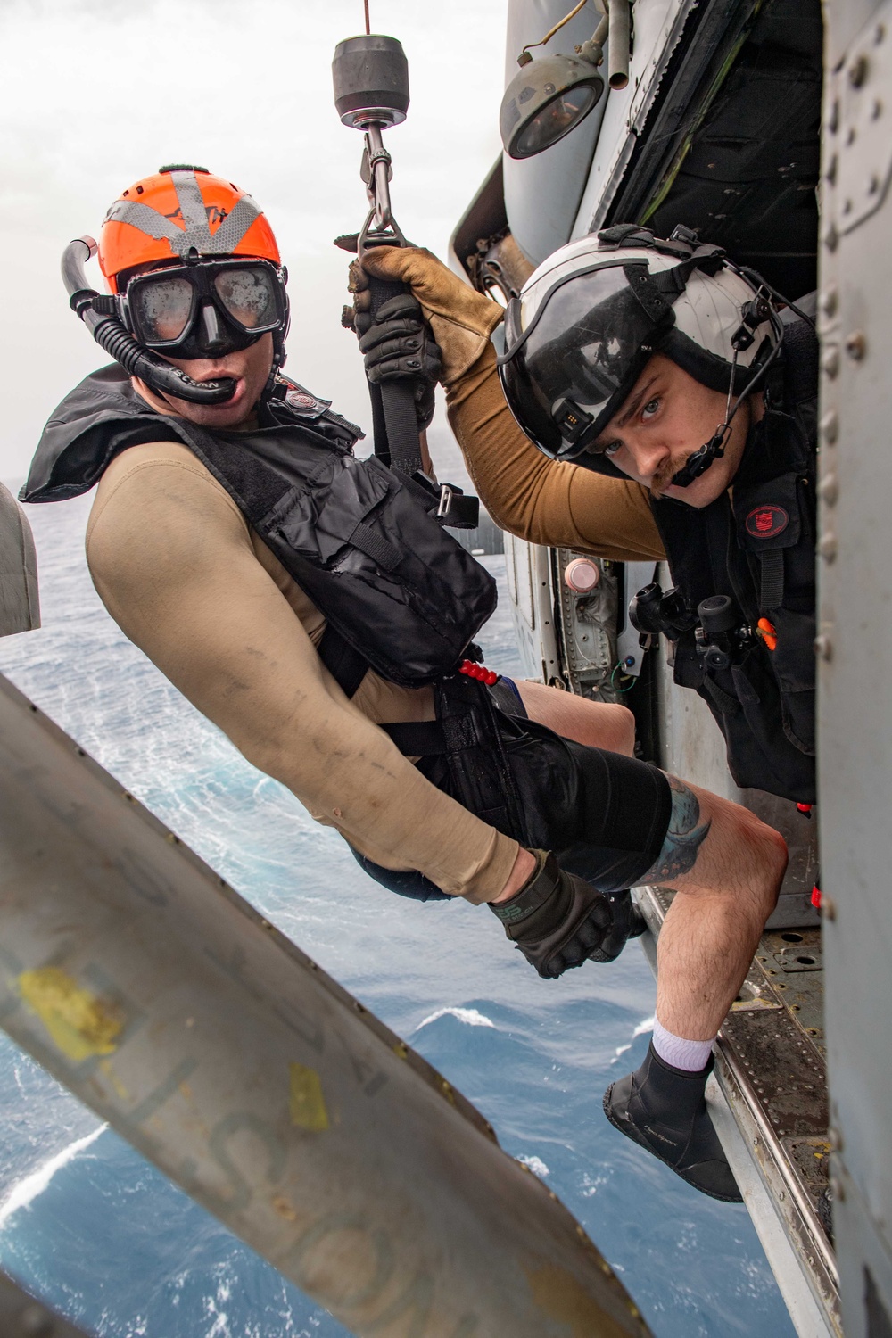 Naval Aircrewmen (Helicopter) Participate in a Live-Hoisting Exercise in the Red Sea