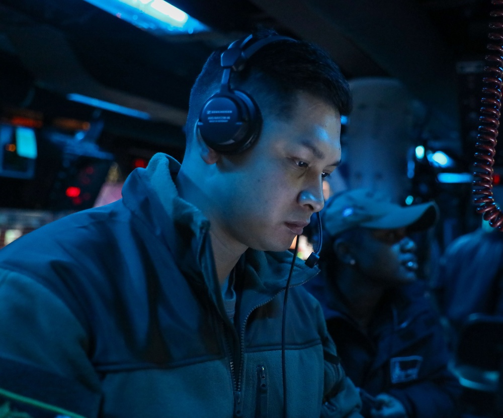 Sailors Aboard the USS Howard conduct an anti-submarine warfare exercise in the Philippine Sea