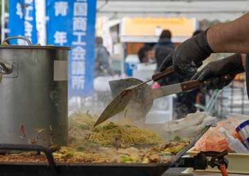 Building Relations: Volunteers from the Single Marine Program travel to the Iwakuni Junior College to celebrate the iwatan festival