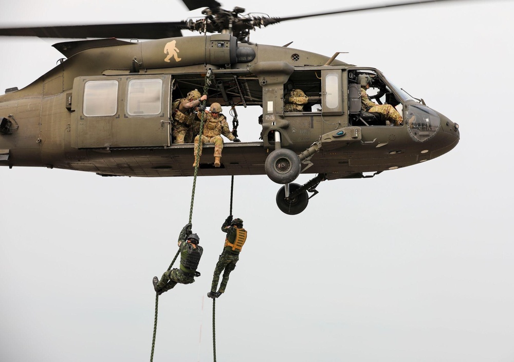 U.S. Army Soldiers conduct K9 FRIES training with Thai counterparts